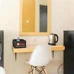 Comfortable Patraland Urbano Studio Apartment Near Train Station By Travelio